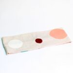 Trak za ušesa - Melirano bež s potiskom pastelnih krogov