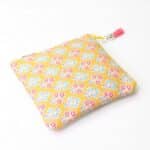 Torbica za higienske vložke - zenf rumena s potiskom cvetlic